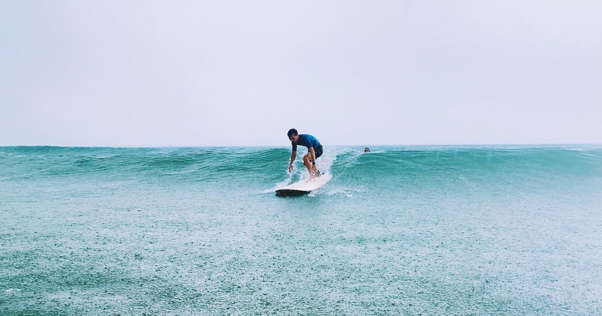 Male surfer on My Khe beach