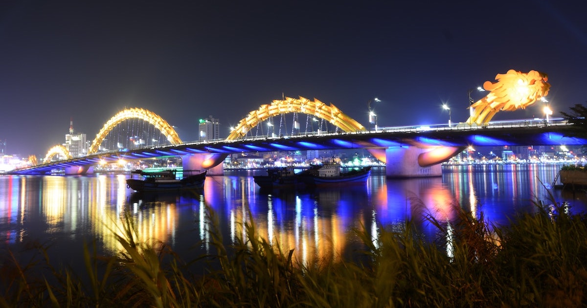 Golden dragon on a bridge at night