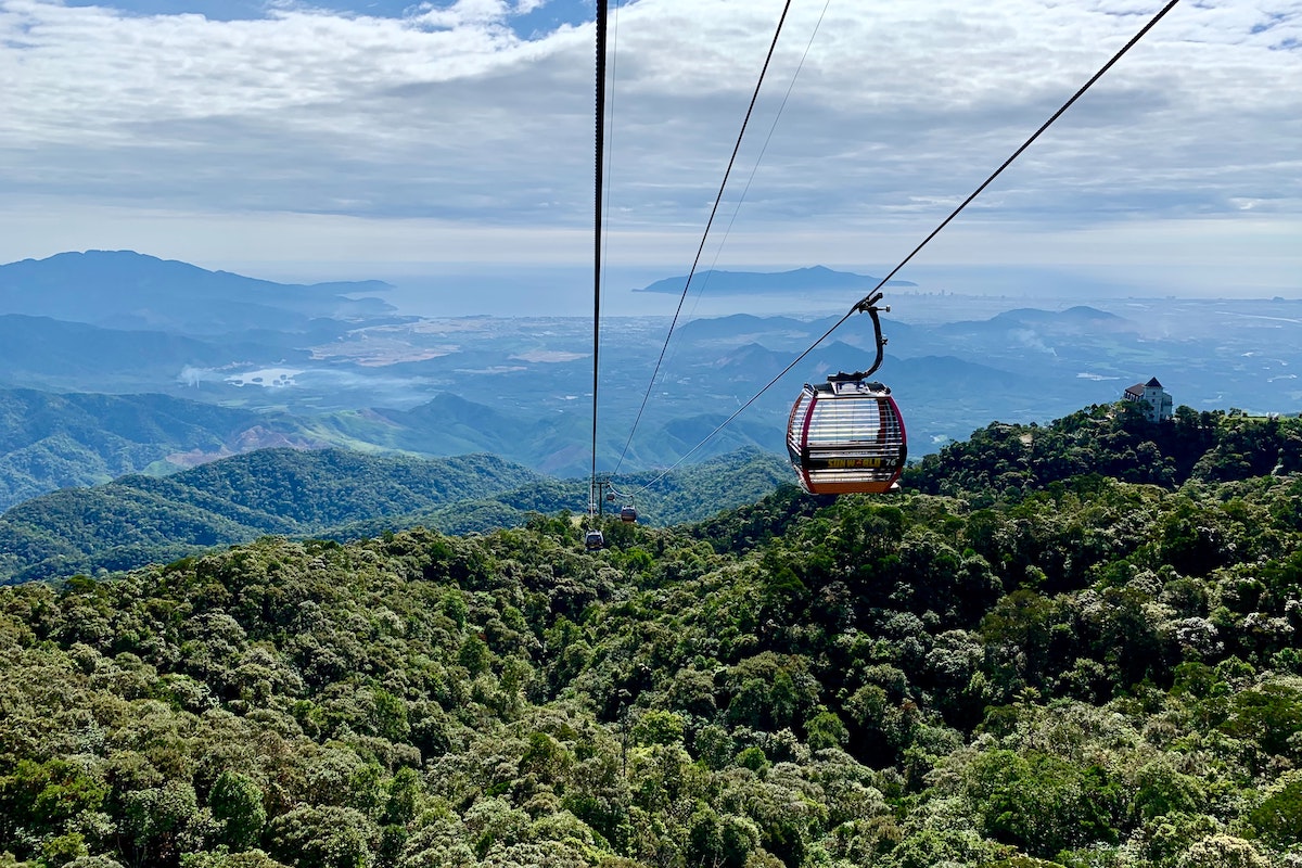 Cable car over mountains and forests