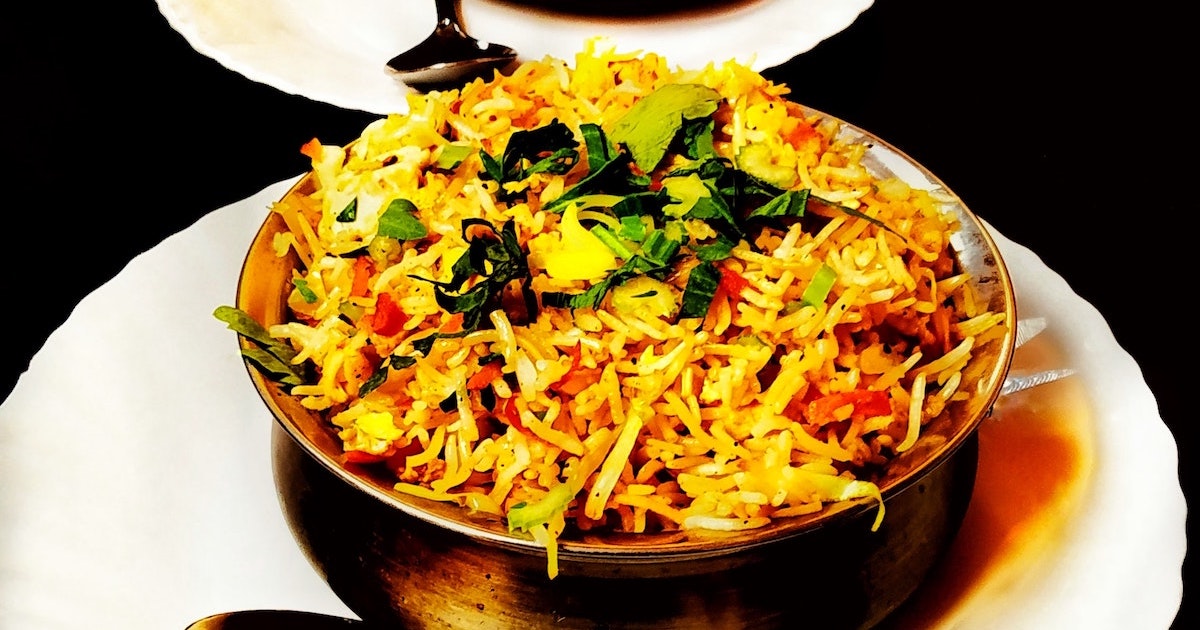 Yellow biryani in a bowl