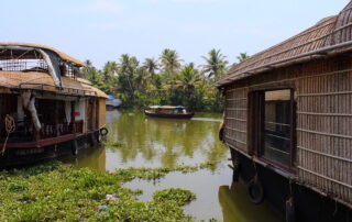 Backwaters with three wooden houseboats