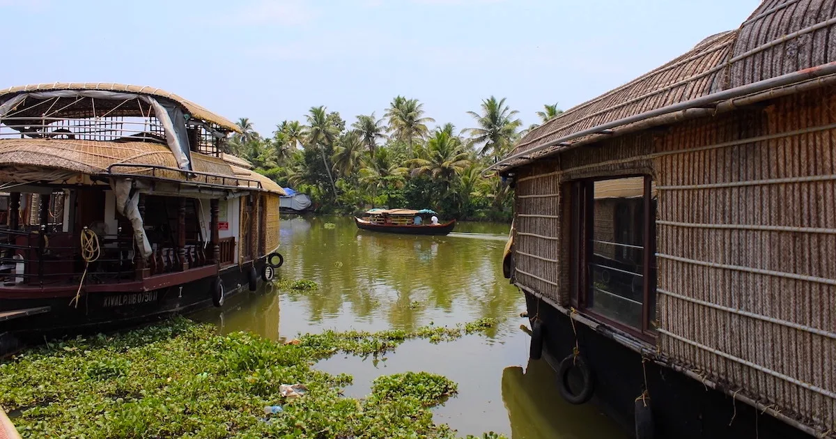 Backwaters with three wooden houseboats