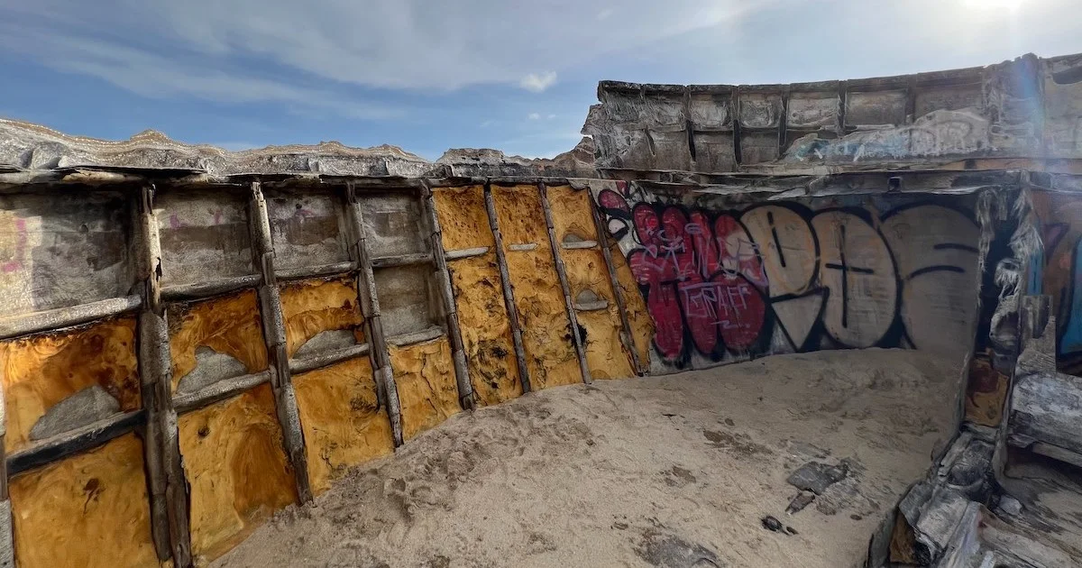 The grooves and graffiti on the Nunggalan Beach shipwreck