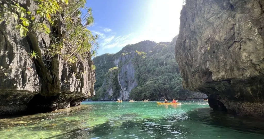 Shallow water surrounded by limestone cliffs at Big Lagoon in El Nido.
