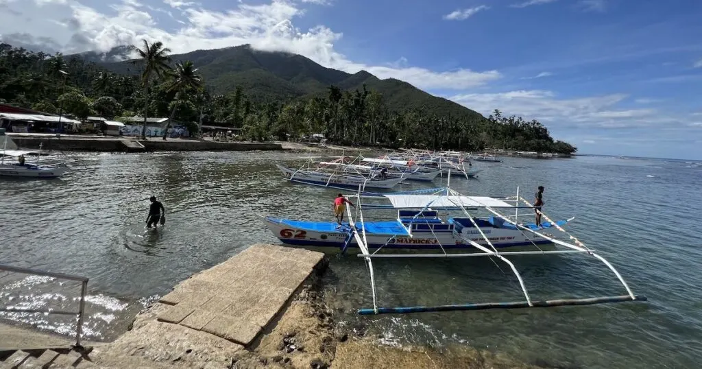 A bangka boat is pulled up at the port in Puerto Princesa.