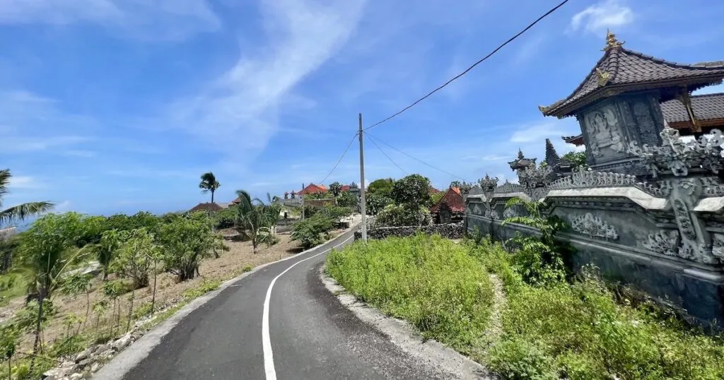 The road to Suwehan beach winds past typical Balinese architecture