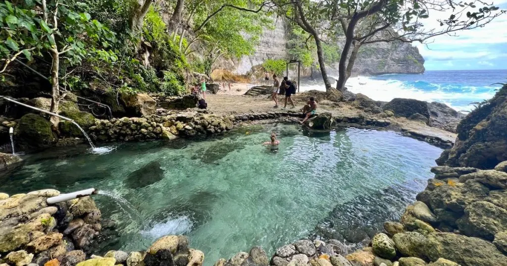 Natural swimming pool in front of a beach at Tembeling Beach and Forest