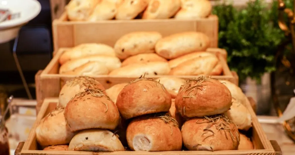 Piles of bread at a market in the Philippines.