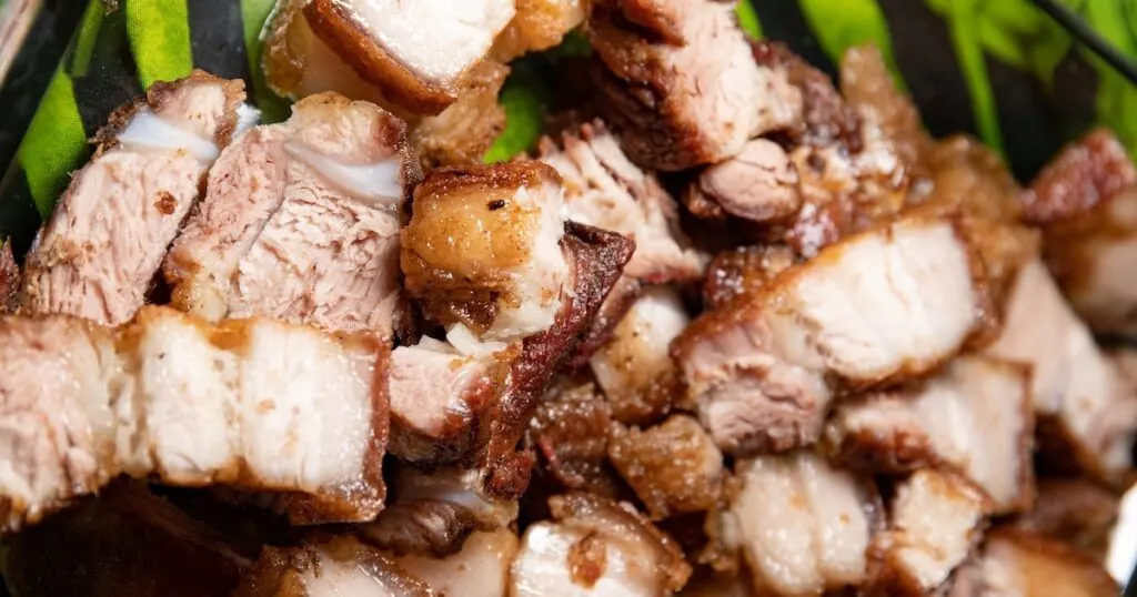 A pile of Lechon pork pieces, one of the most famous foods in the Philippines.