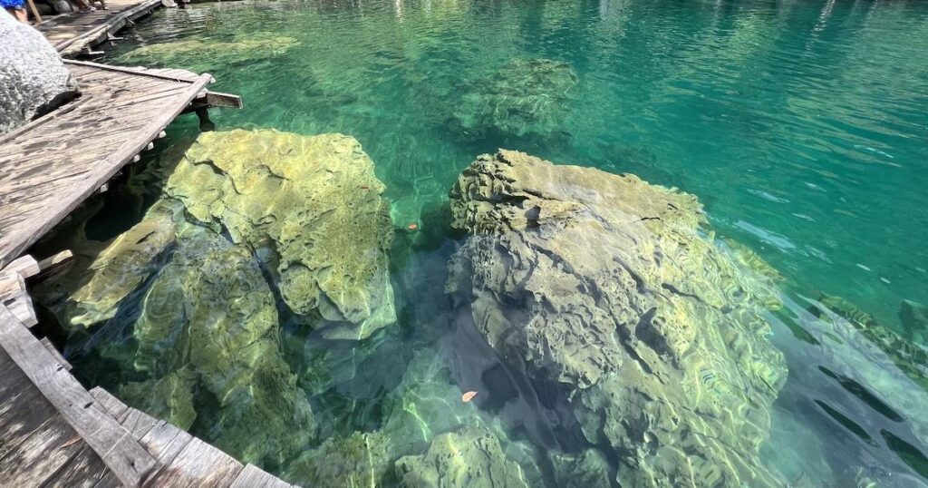 Shallow underwater rocks in Kayangan Lake in Coron.