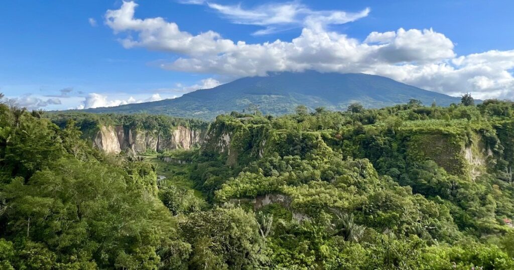 View of Mount Merapi and Sianok Valley from the Panorama Park in Bukittinggi.