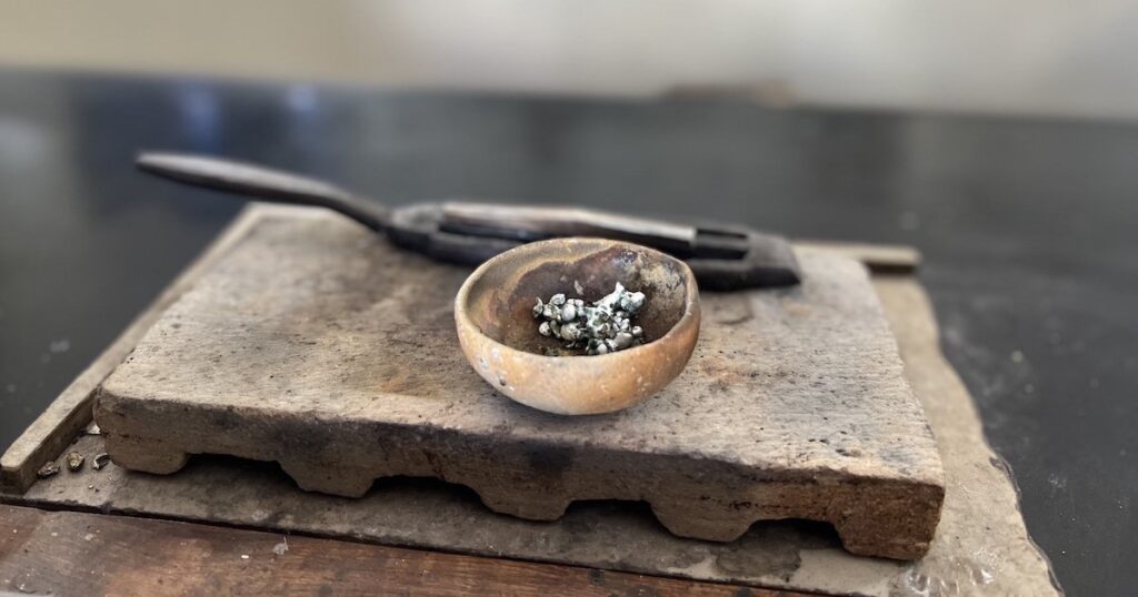 Silver in a bowl in a silversmith in Koto Gadang.