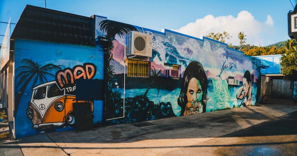 Graffiti art on a wall in Cairns CBD depicting an RV ran.