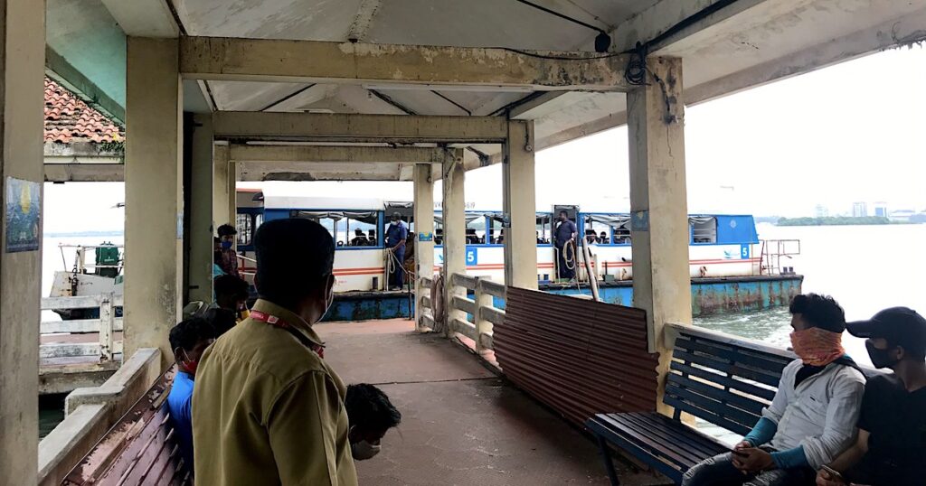 Locals wait for the ferry in Kochi, Kerala.