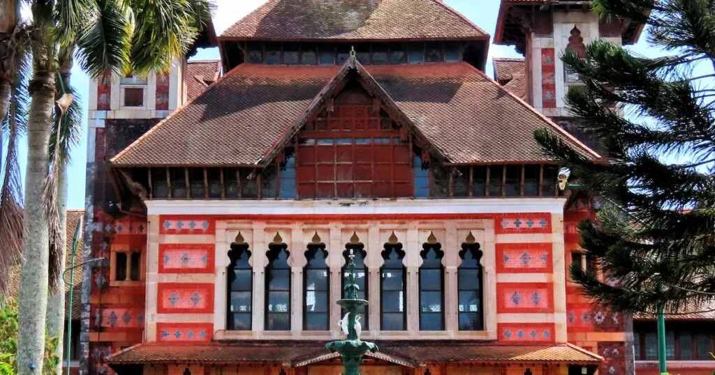 Red paint and a thatched roof at the British colonial-style Napier Museum in Trivandrum.