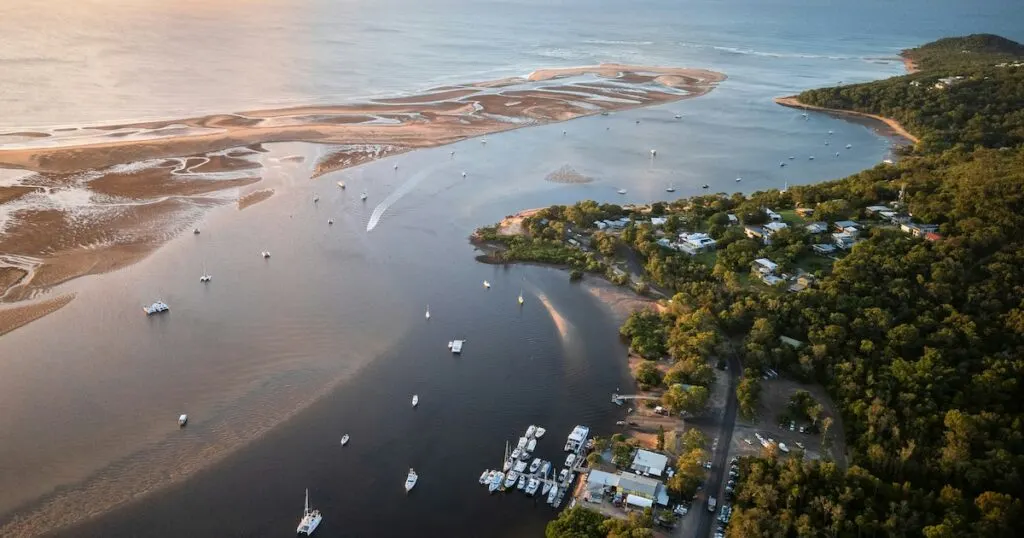 Aerial view of boats in the water at Seventeen Seventy in Queensland.