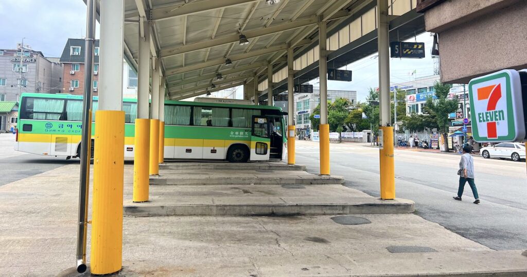 A large, green bus parked in a bay at Sokcho Intercity Bus Terminal.